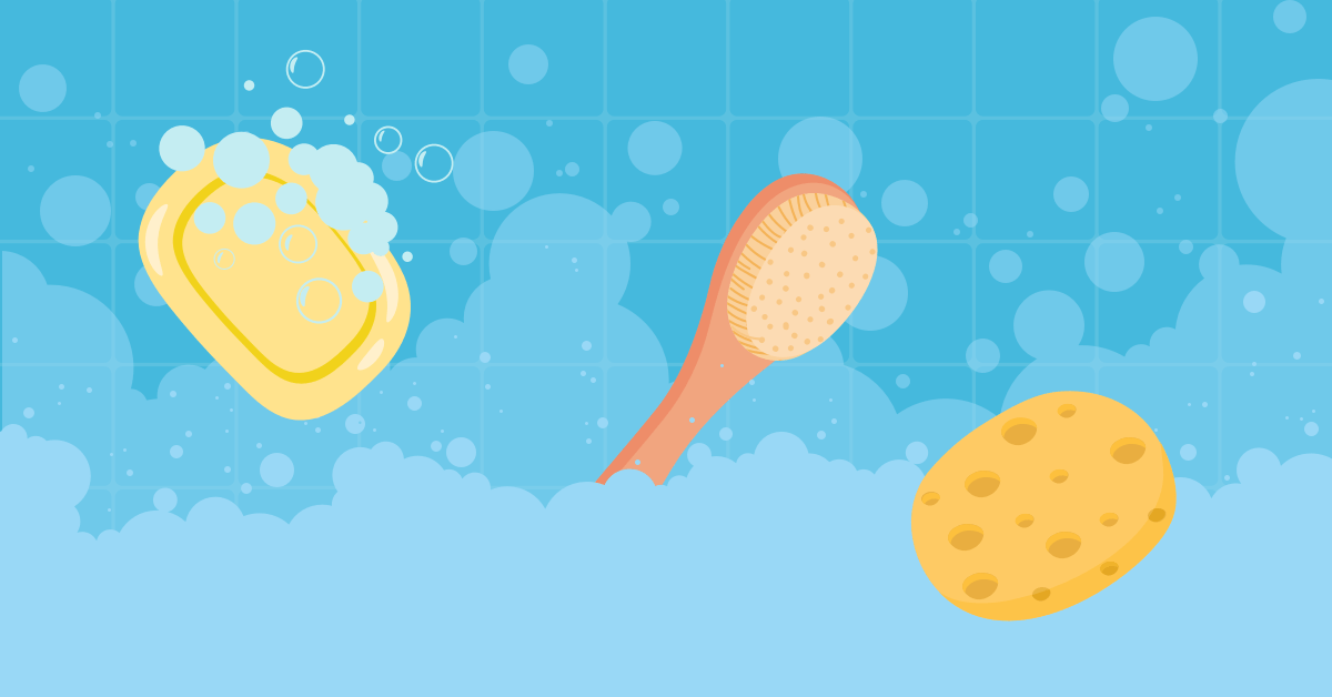 Your Guide to an Eco-Friendly Shower words on a blue tiled wall with a bar of soap, scrubbing brush, sponge, and soap bubbles.
