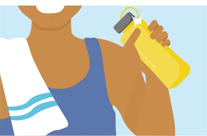 Person holding reusable water bottle.