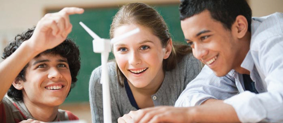 three teenagers experimenting with wind turbine
